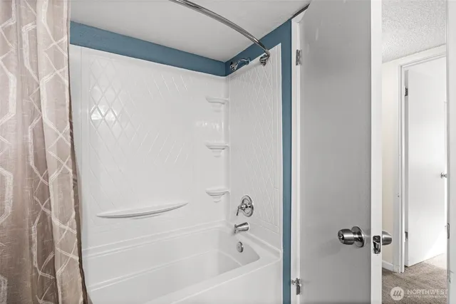 a bathroom with a bathtub