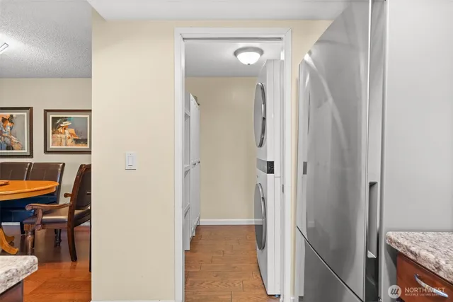 a view of a livingroom with furniture and wooden floor