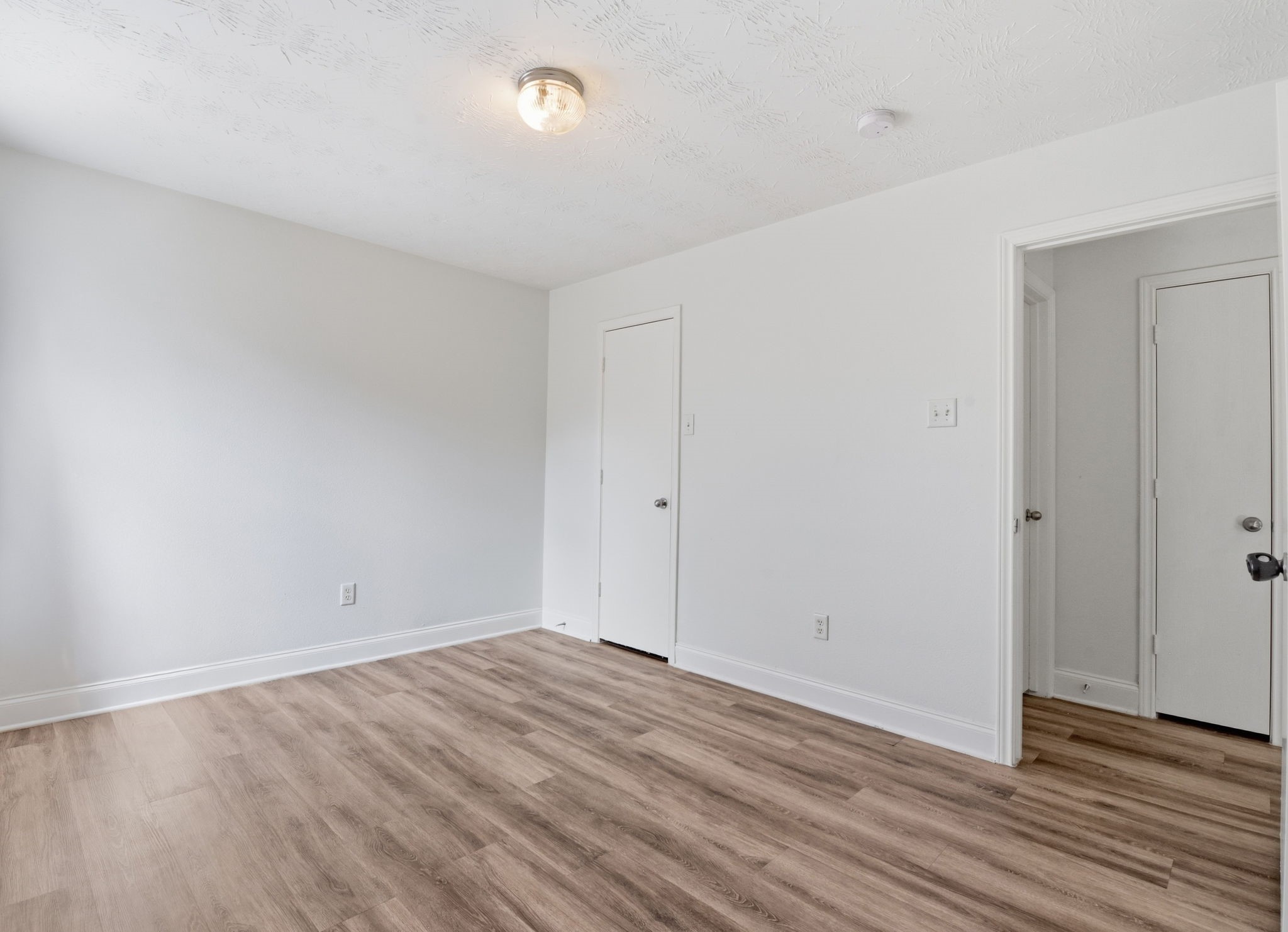 19013 Hammer Lane Porter, TX 77365 - Photo 18 of 35 a view of room with wooden floor
