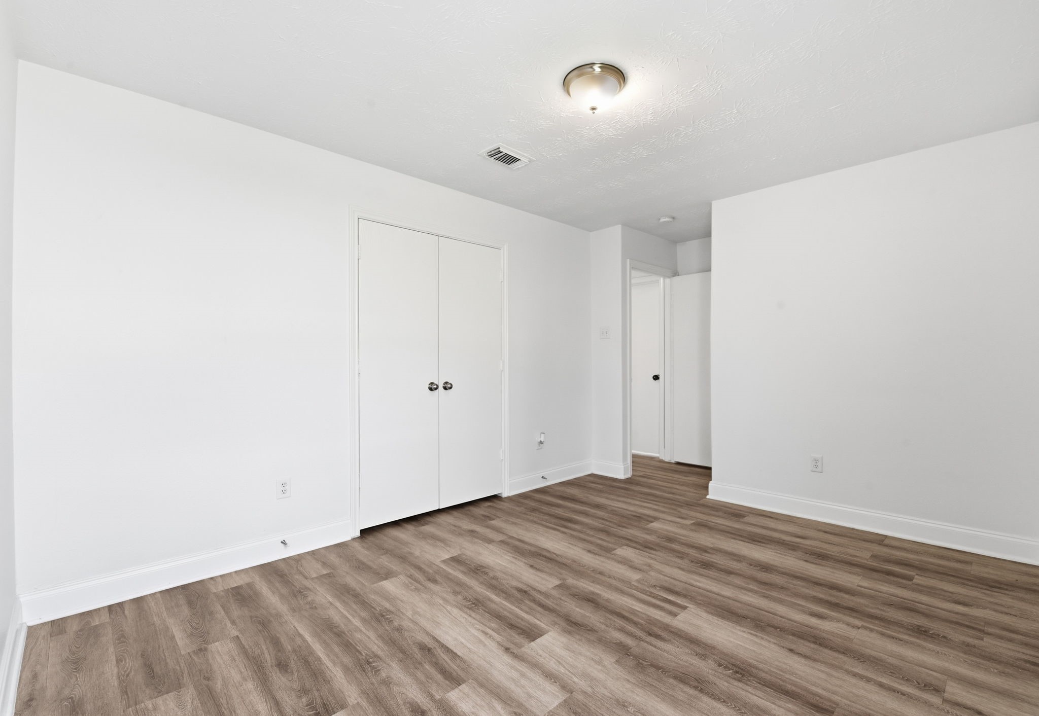 19013 Hammer Lane Porter, TX 77365 - Photo 20 of 35 a view of room with wooden floor