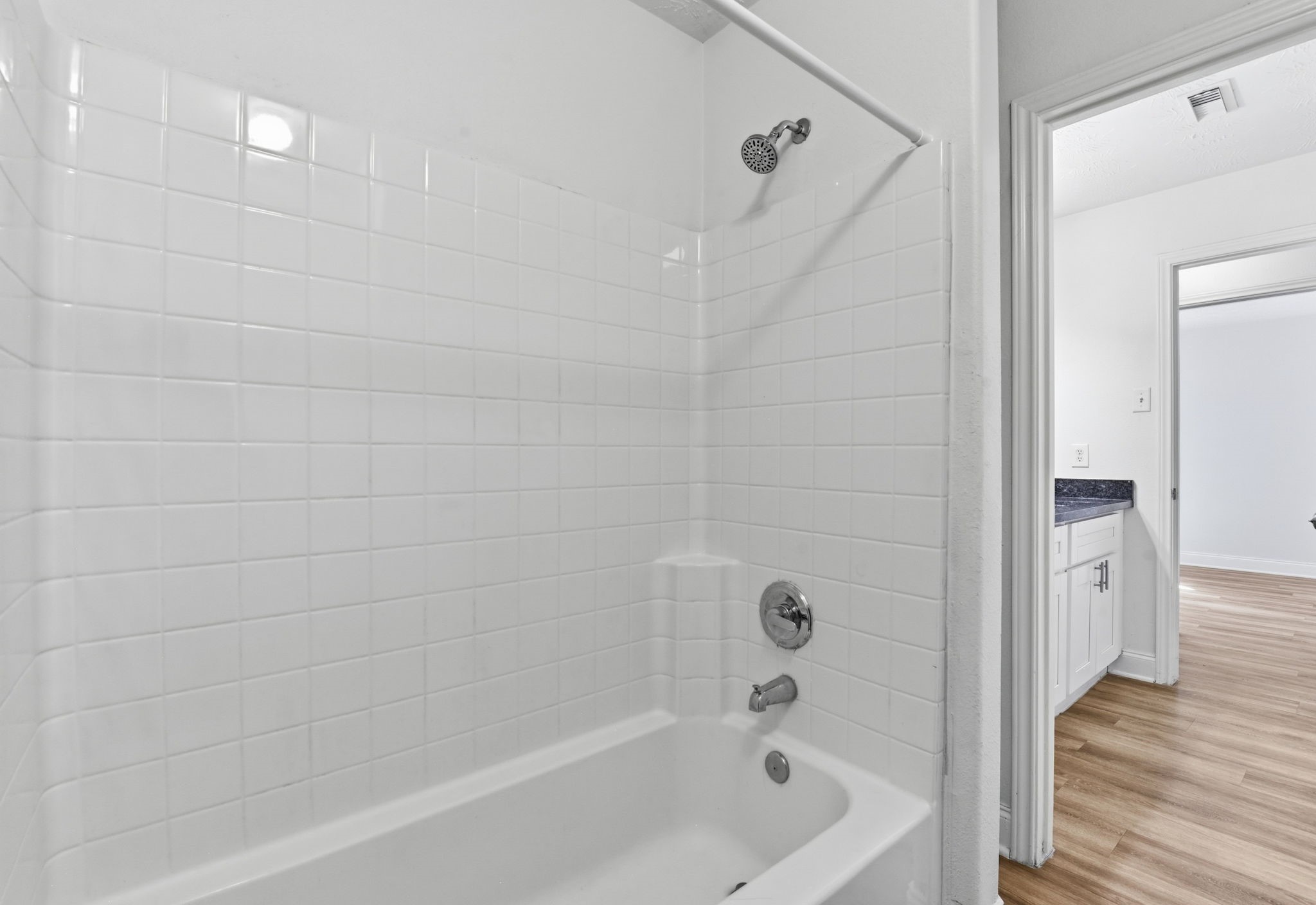 19013 Hammer Lane Porter, TX 77365 - Photo 22 of 35 a bathroom with a bathtub
