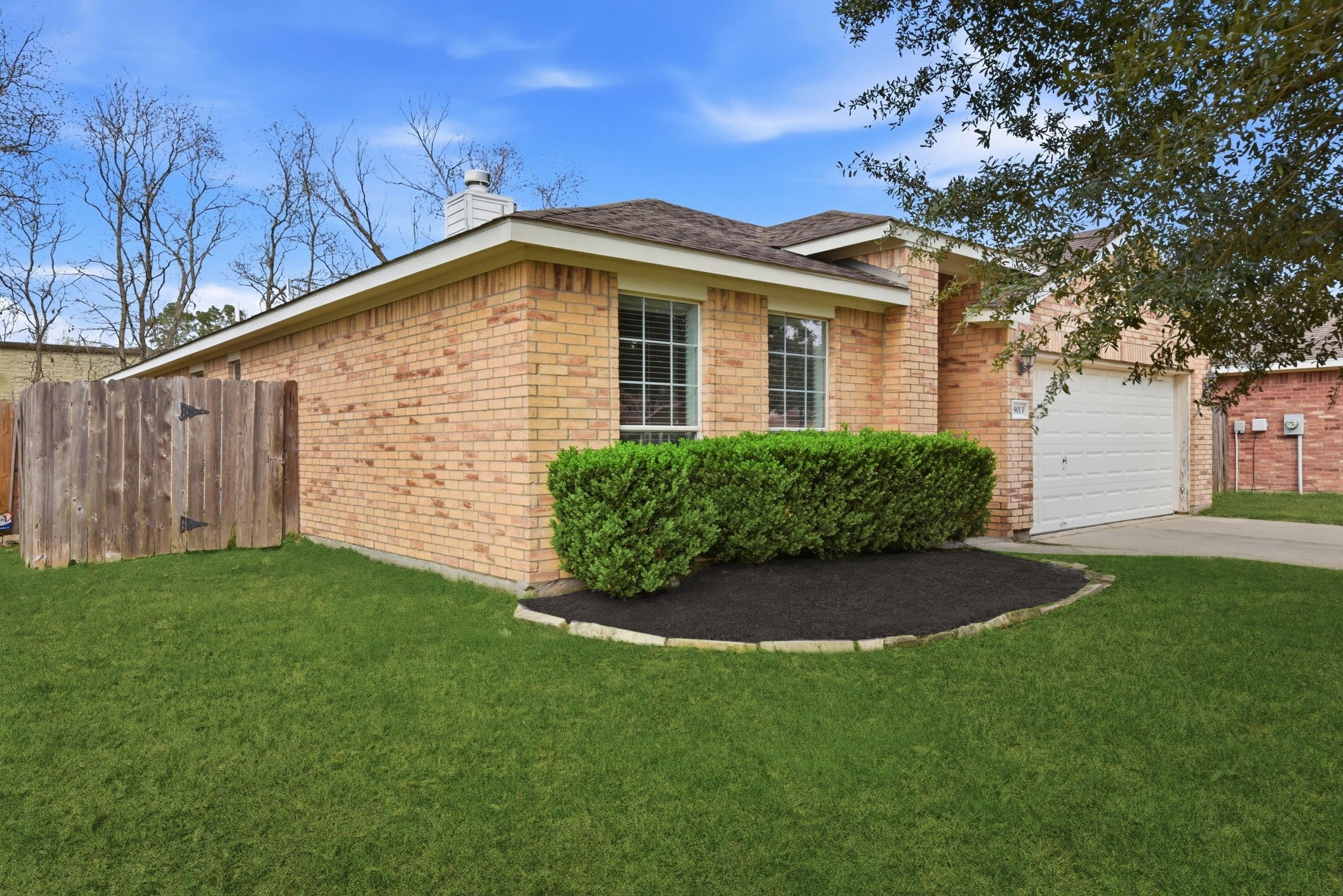 19013 Hammer Lane Porter, TX 77365 - Photo 3 of 35 a view of front of house with a yard
