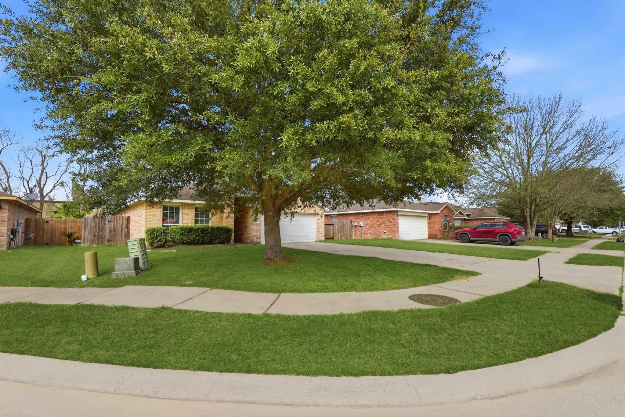 19013 Hammer Lane Porter, TX 77365 - Photo 5 of 35 a front view of a house with a yard and trees