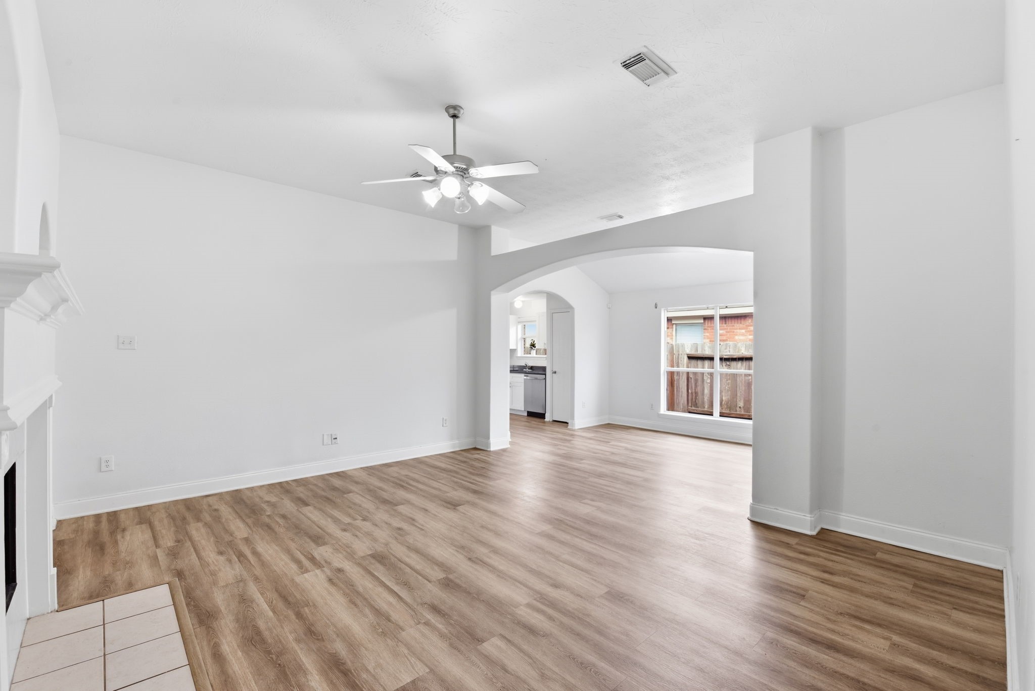 19013 Hammer Lane Porter, TX 77365 - Photo 7 of 35 wooden floor in an empty room with a window