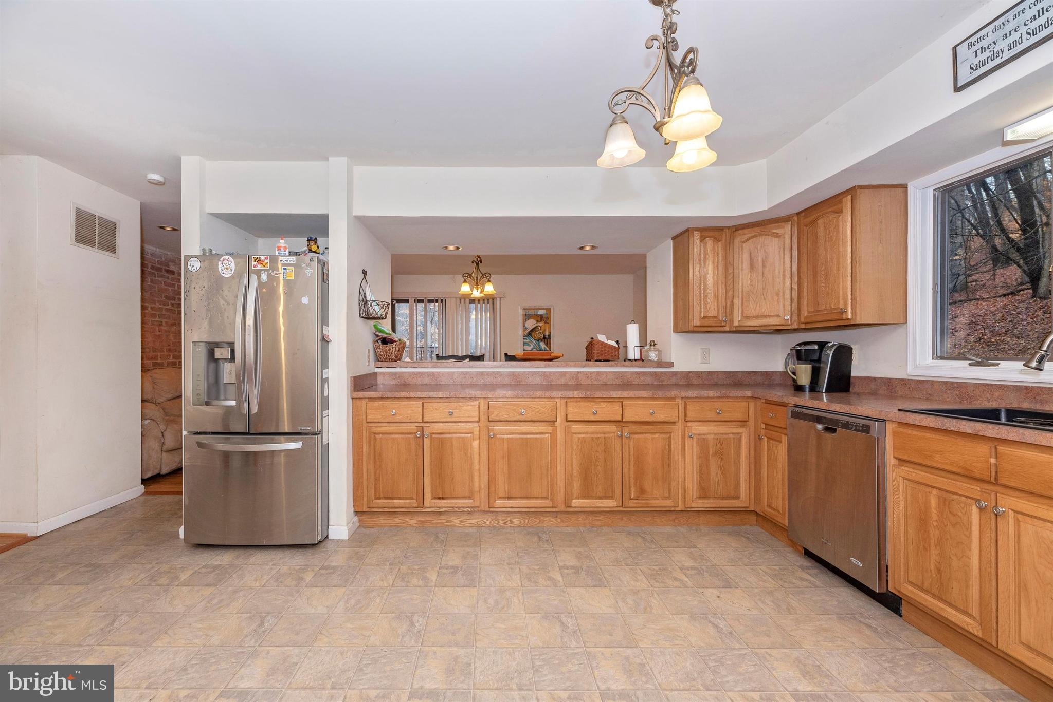 4517 Elmer Derr Road Frederick, MD 21703 - Photo 17 of 48 Kitchen has Dining Room Pass-thru & Breakfast Bar