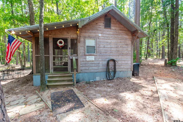 a front view of house with outdoor space