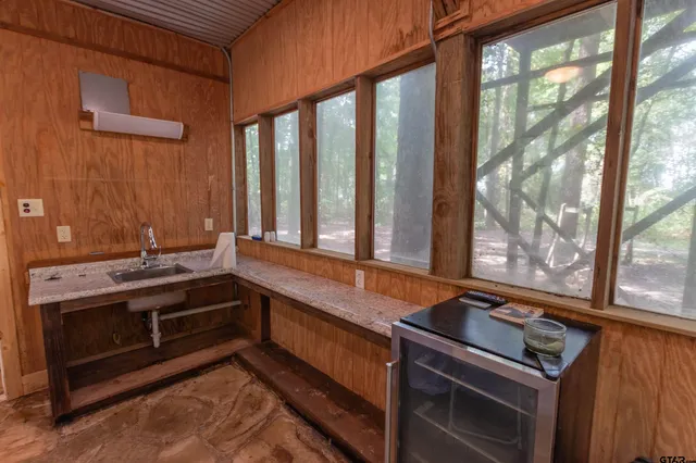 a kitchen with a stove and a sink