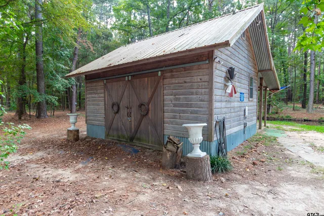 a backyard of a house with lots of green space