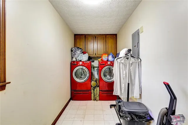 a bathroom with a granite countertop sink a mirror and a vanity