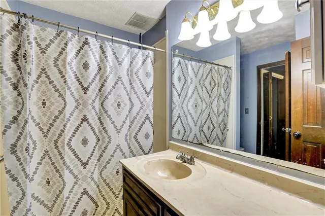 a living room with furniture window and a flat screen tv