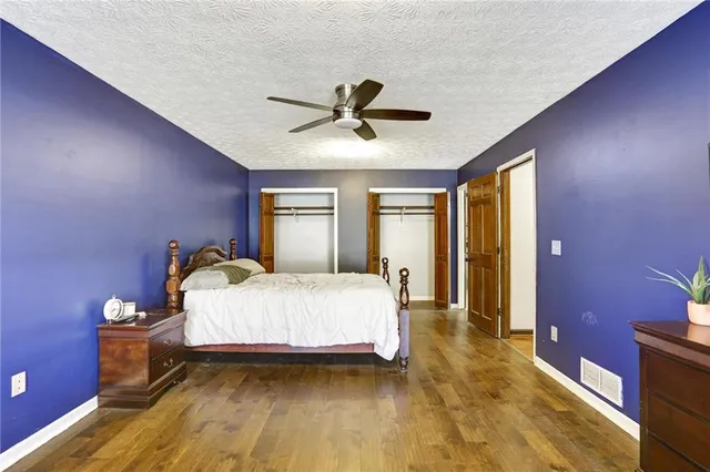 a view of balcony with wooden floor and outdoor seating