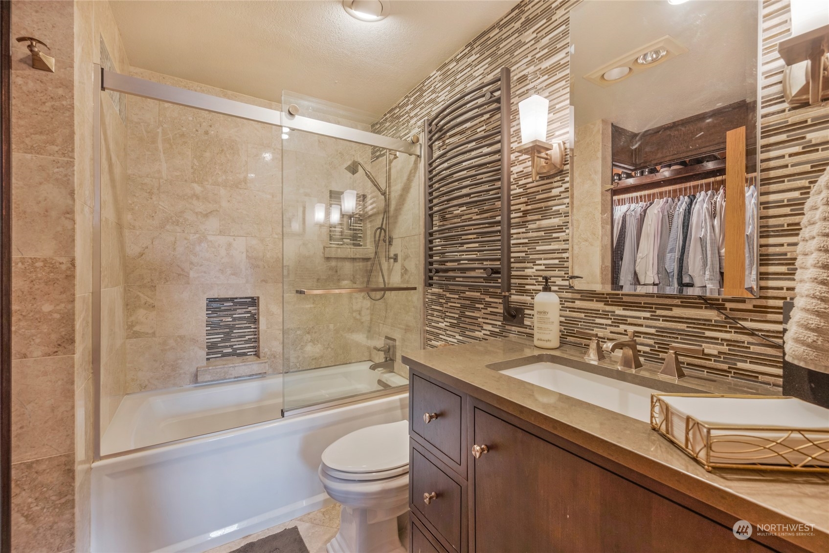 2529 166th Place Southeast Bothell, WA 98012 - Photo 26 of 35 a bathroom with a granite countertop sink toilet and shower
