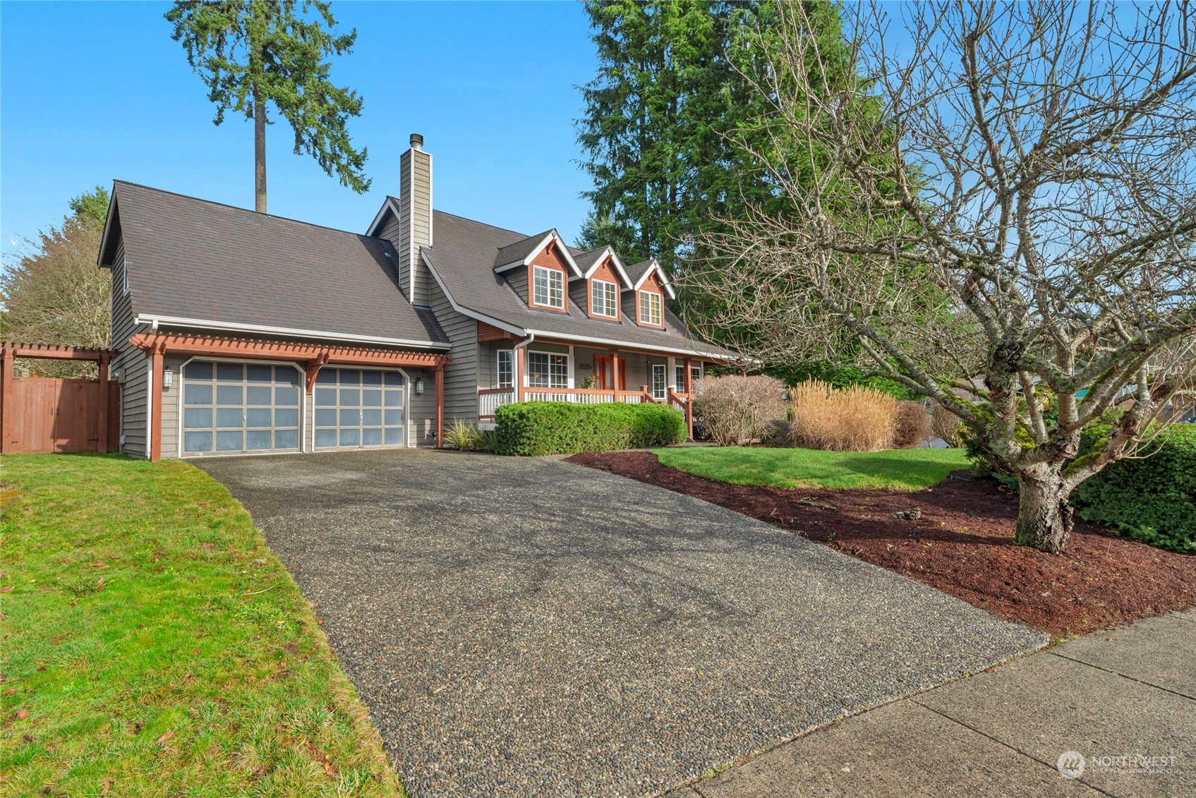 2529 166th Place Southeast Bothell, WA 98012 - Photo 34 of 35 front view of a house with a yard