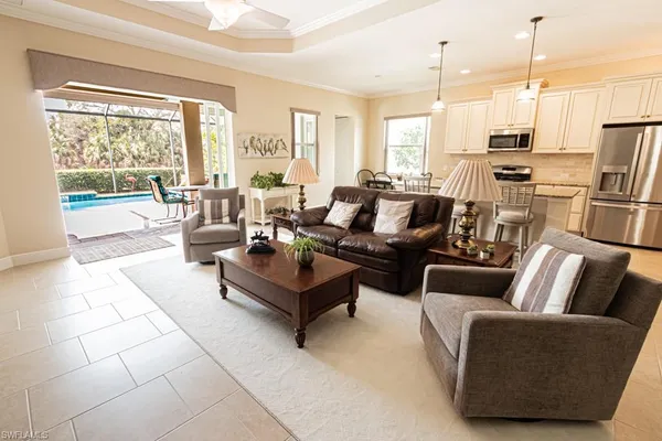 a large kitchen with stainless steel appliances lots of counter top space