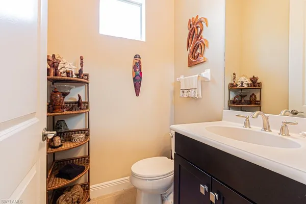 a bedroom with a bed and a cabinets