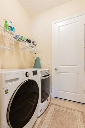 a work room with a table and chairs