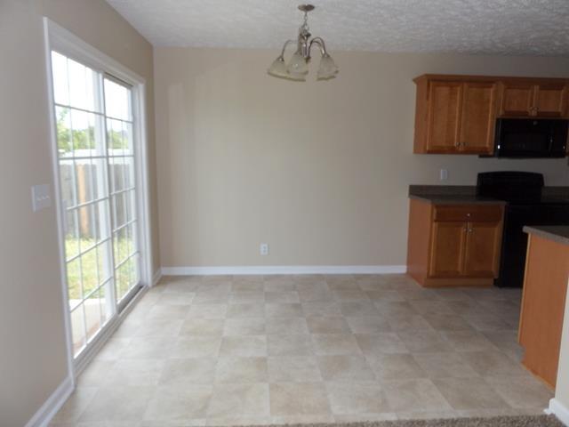 647 Crescent Road Murfreesboro, TN 37128 - Photo 13 of 23 Dining area with patio access for easy grilling.