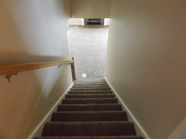 647 Crescent Road Murfreesboro, TN 37128 - Photo 20 of 23 Stairs from Living room to 2nd floor expandable space.