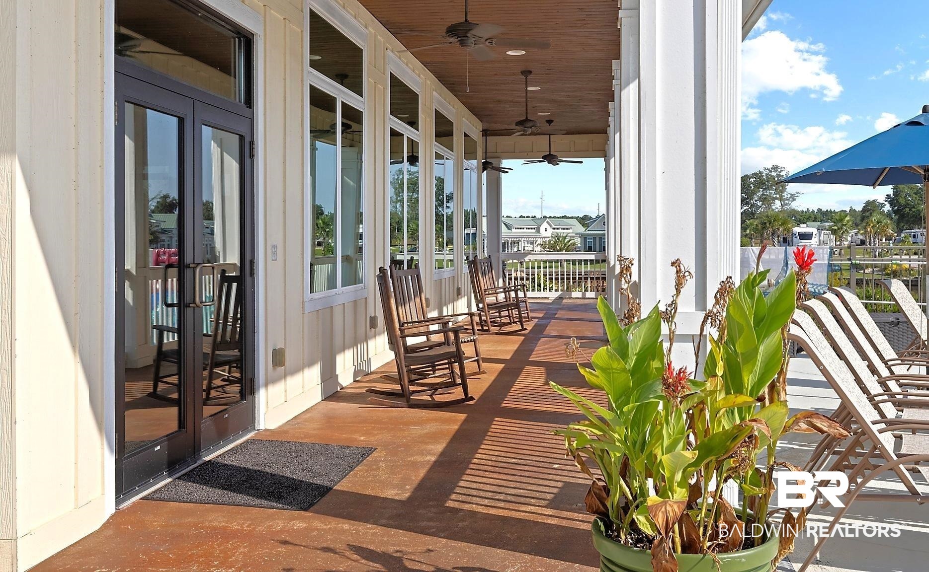 28114 Preserve Trail, Unit 190 Elberta, AL 36530 - Photo 36 of 69 Covered porch with french doors and a ceiling fan