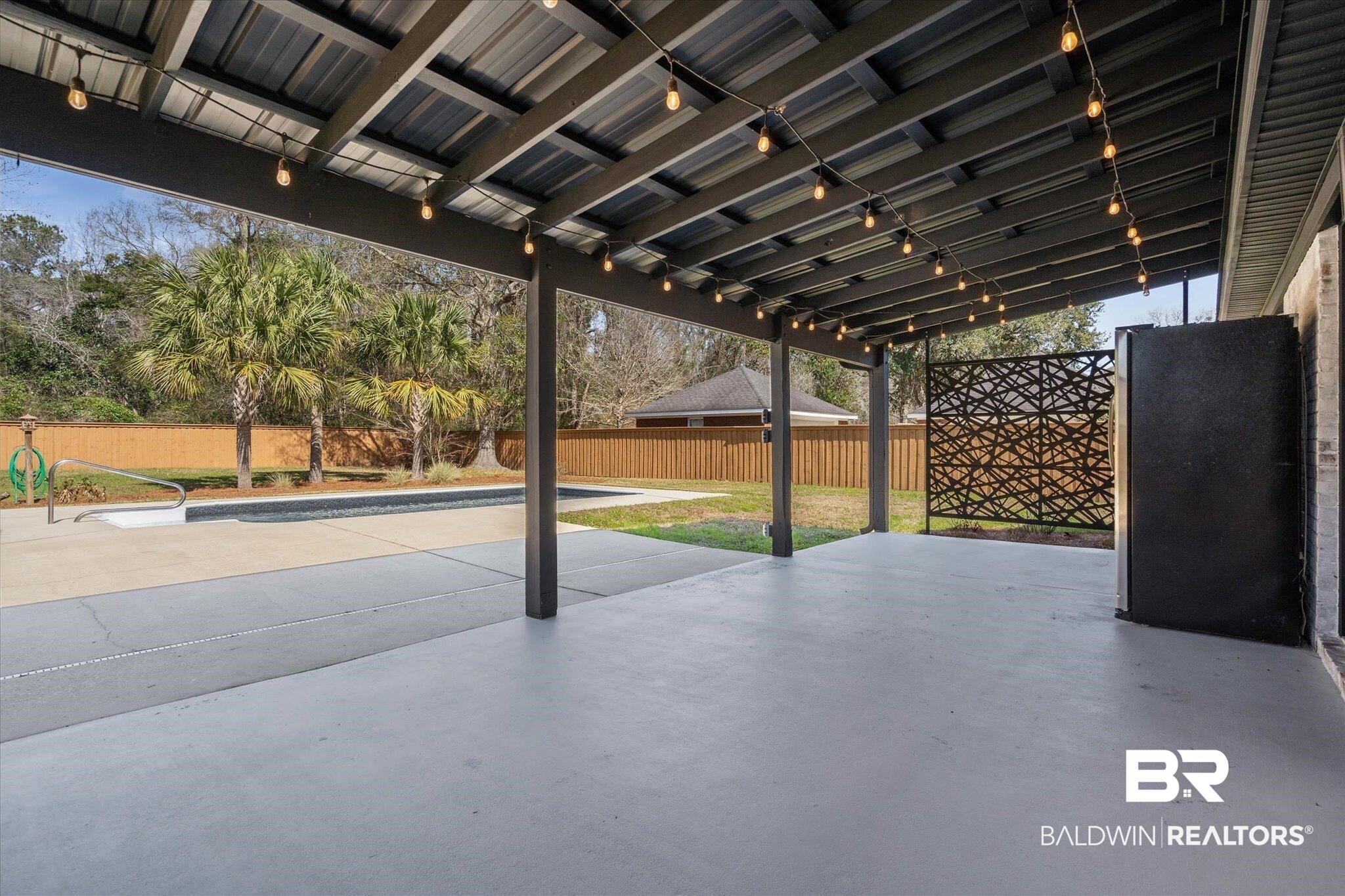 3216 Bay Booster Club Road Theodore, AL 36582 - Photo 23 of 46 Fenced backyard featuring a patio area