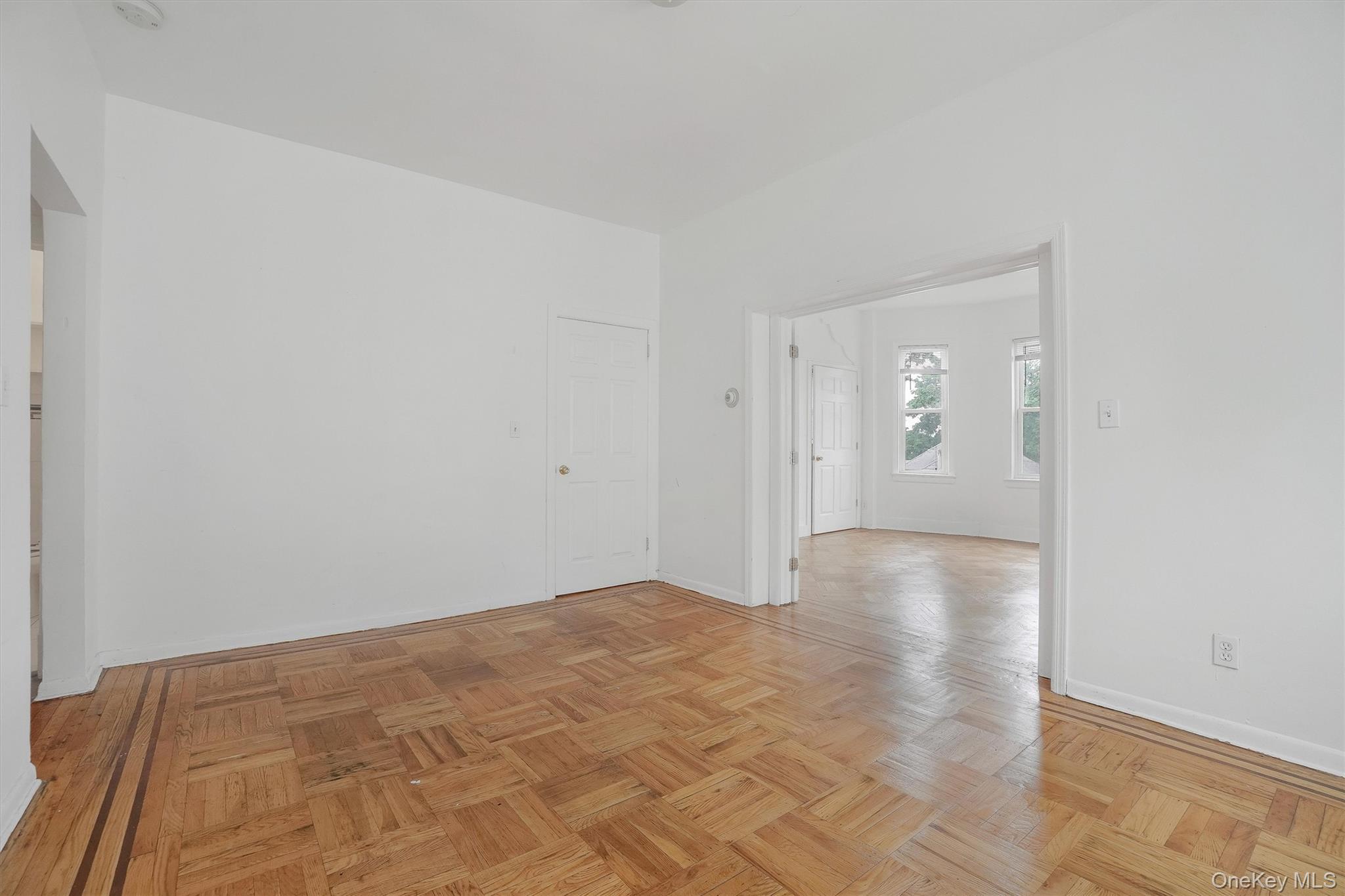 357 Dyckman Street Peekskill, NY 10566 - Photo 12 of 48 a view of empty room with wooden floor
