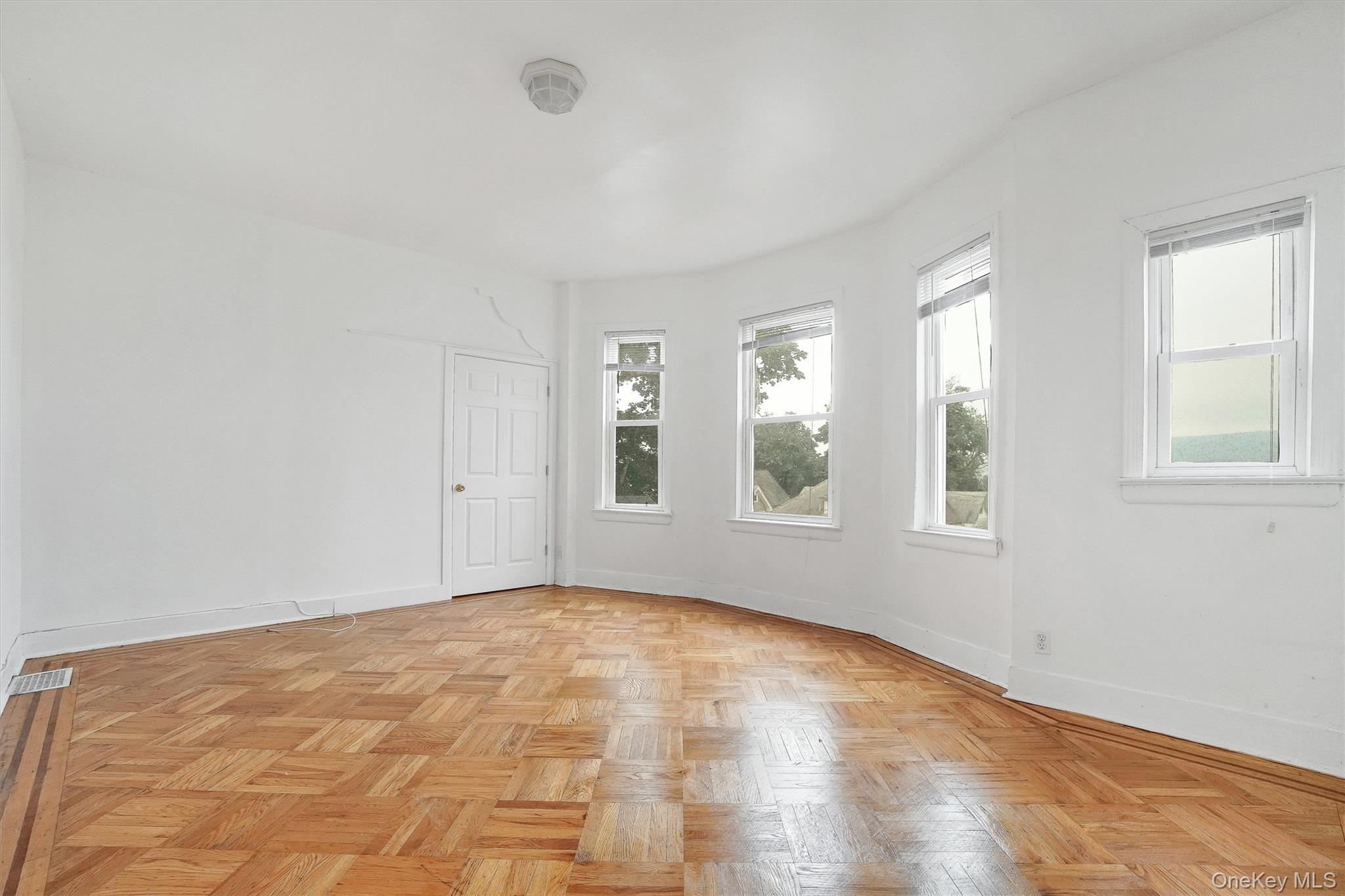 357 Dyckman Street Peekskill, NY 10566 - Photo 13 of 48 a view of an empty room with a window