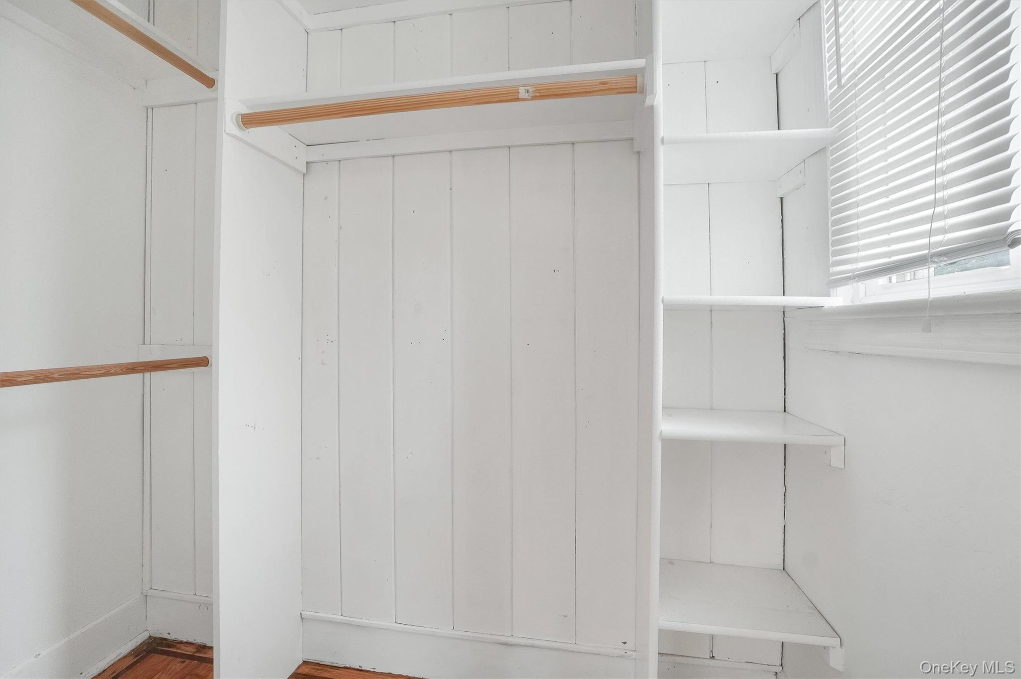 357 Dyckman Street Peekskill, NY 10566 - Photo 17 of 48 a view of walk in closet with empty racks