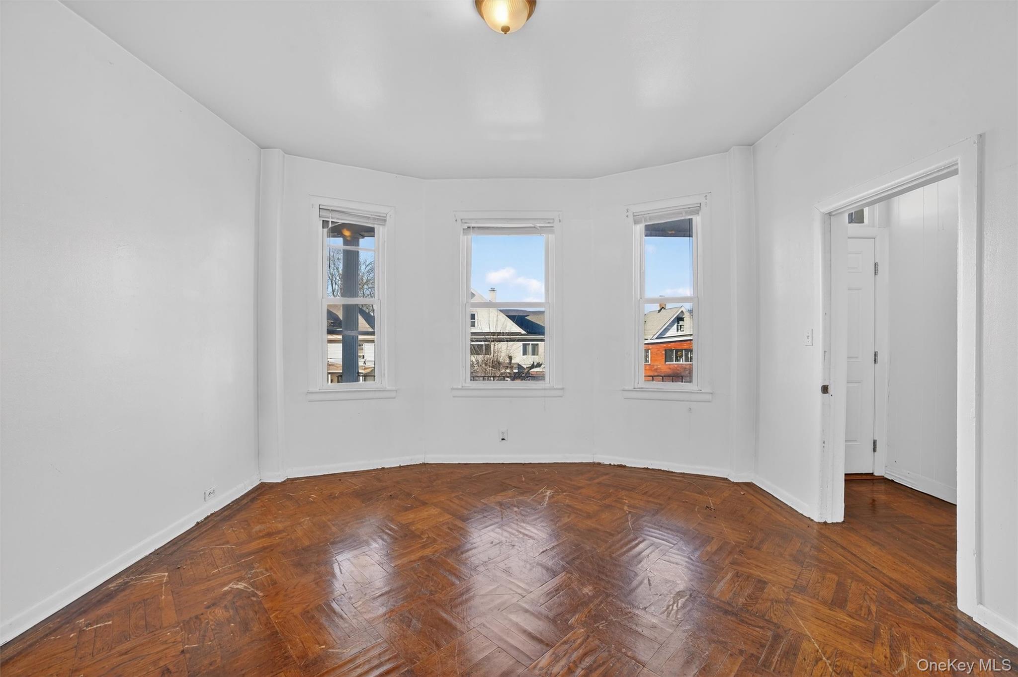 357 Dyckman Street Peekskill, NY 10566 - Photo 33 of 48 a view of empty room with wooden floor