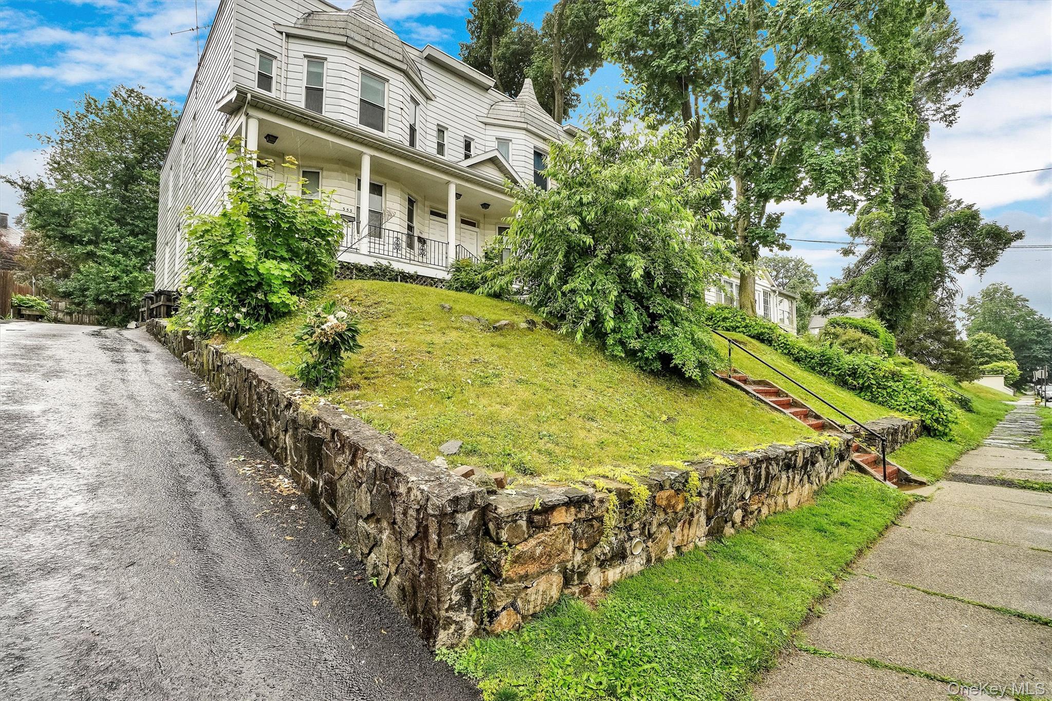 357 Dyckman Street Peekskill, NY 10566 - Photo 4 of 48 a view of an buildings with swimming pool