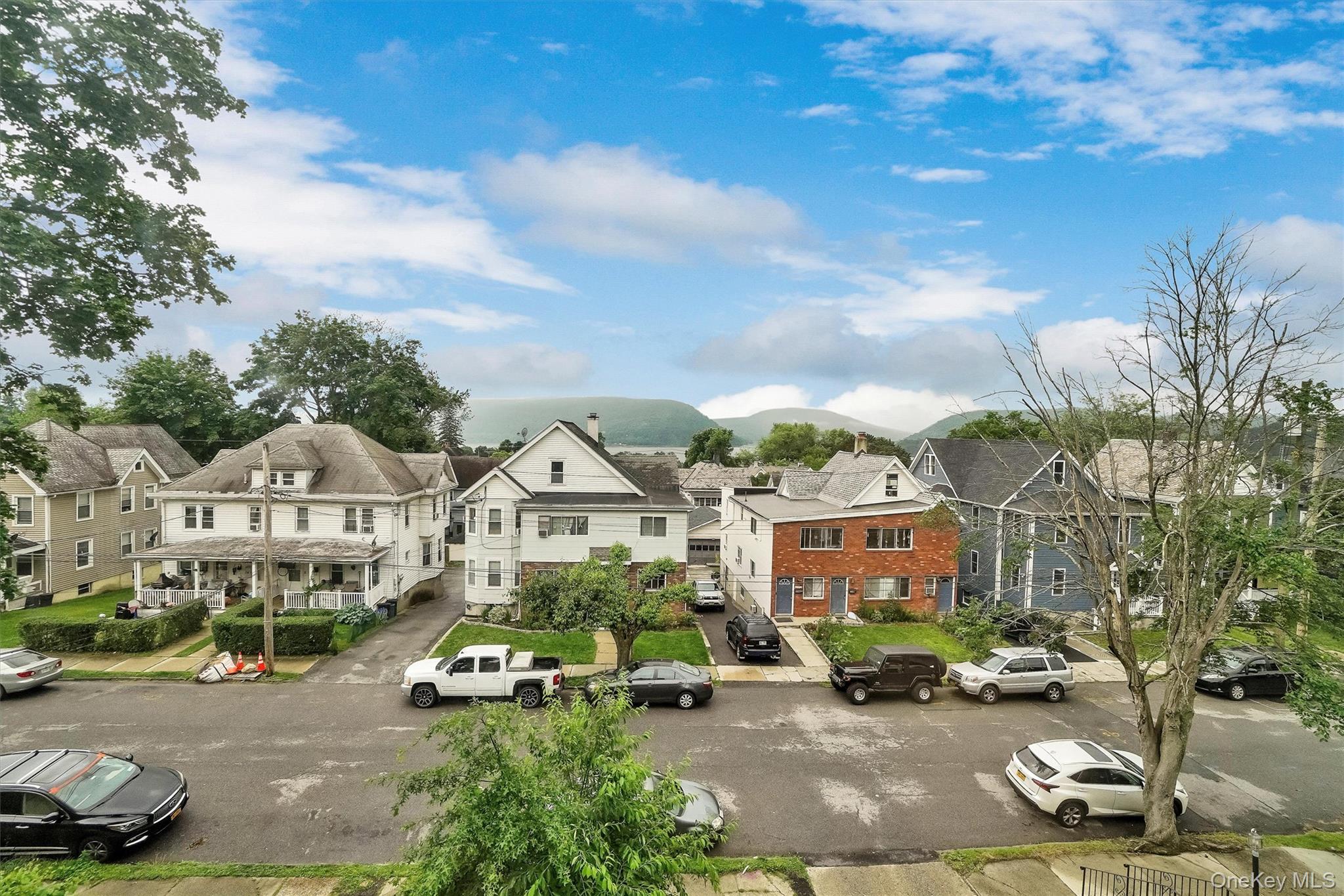 357 Dyckman Street Peekskill, NY 10566 - Photo 42 of 48 a view of multiple houses with a street