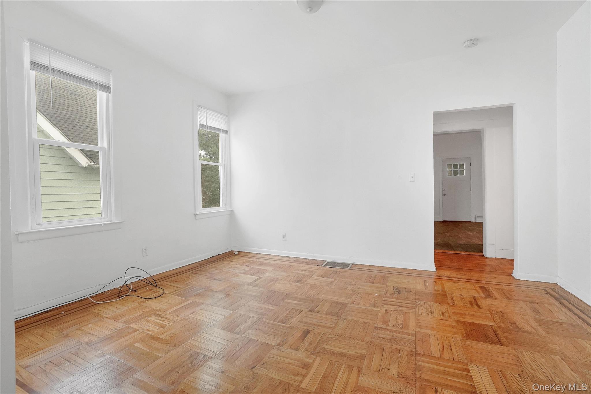 357 Dyckman Street Peekskill, NY 10566 - Photo 9 of 48 a view of an empty room and window