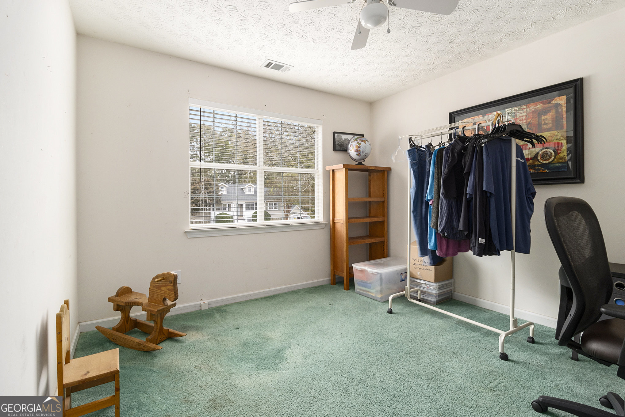 248 Fern Court Hampton, GA 30228 - Photo 17 of 20 a view of a room with gym equipment
