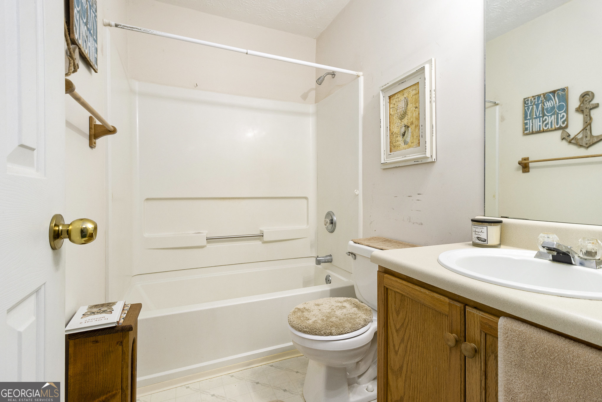 248 Fern Court Hampton, GA 30228 - Photo 20 of 20 a bathroom with a sink a toilet and shower