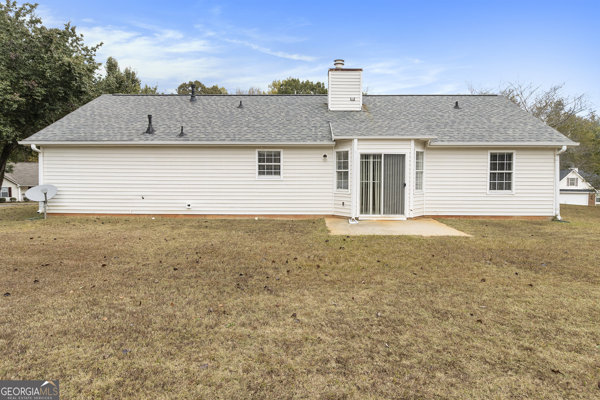 248 Fern Court Hampton, GA 30228 - Photo 6 of 20 a front view of house with yard and trees in the background