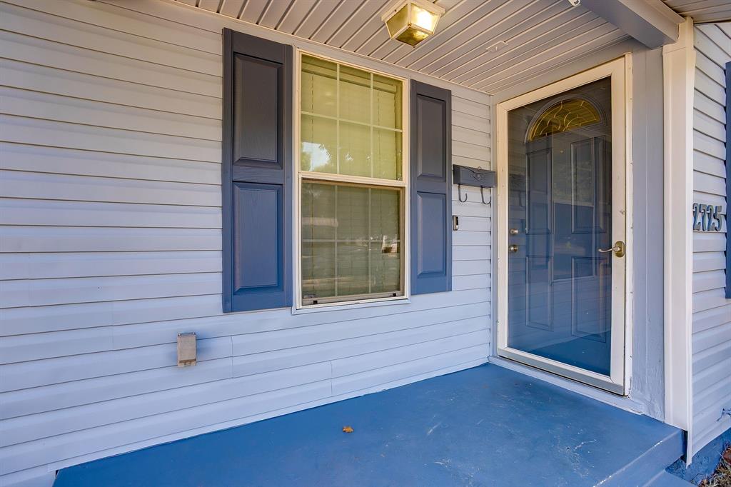 2725 Halbert Street Fort Worth, TX 76112 - Photo 14 of 15 View of exterior entry featuring a patio area