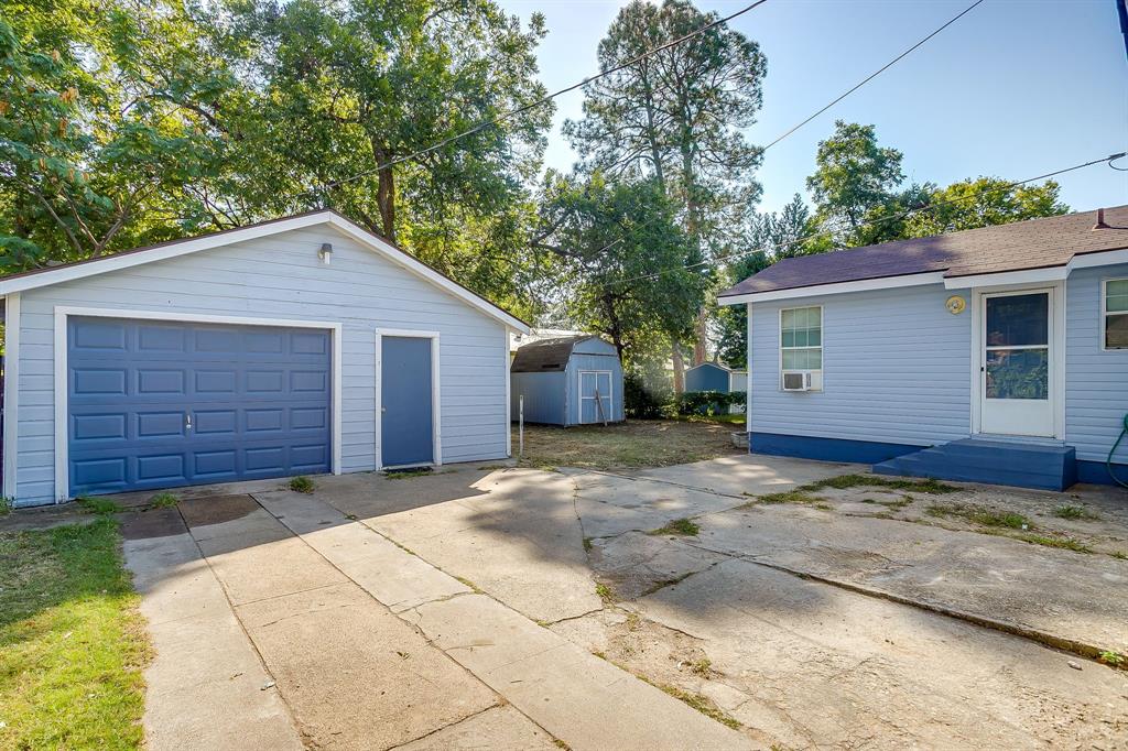 2725 Halbert Street Fort Worth, TX 76112 - Photo 8 of 15 Detached Guest Cottage featuring concrete driveway and a shed