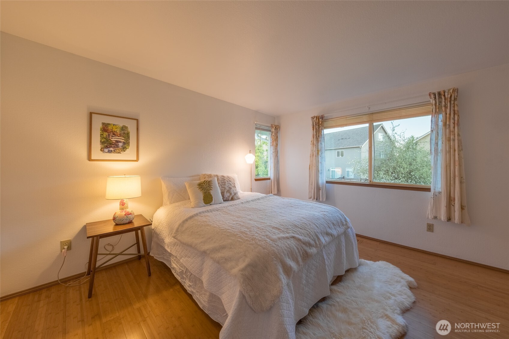 830 234th Street Southeast Bothell, WA 98021 - Photo 8 of 26 a bedroom with a bed and a window