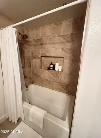 a bathroom with a bathtub