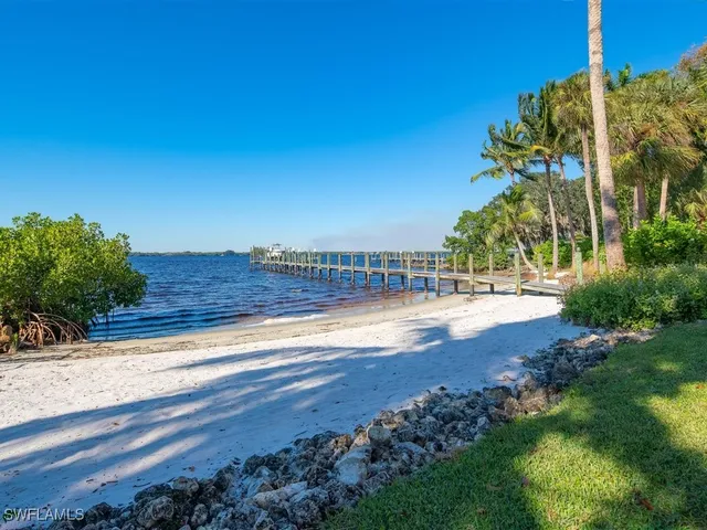 a view of street and car parked on road