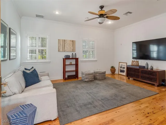 a living room with furniture and window