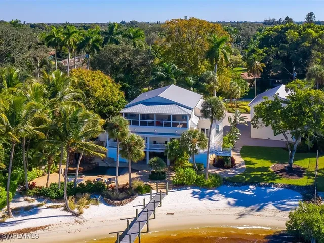 a view of a street with a big yard