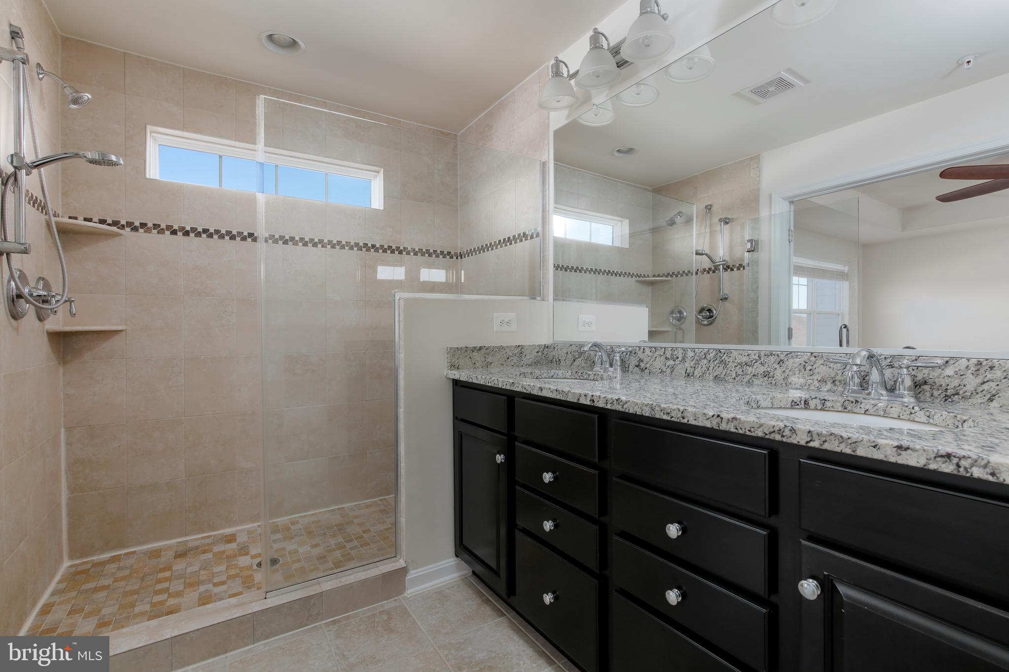 1940 River Vista Drive Baltimore, MD 21221 - Photo 26 of 50 Primary bath with dual vanities