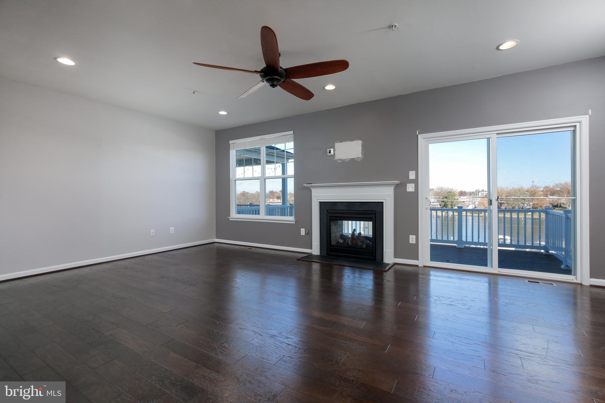 1940 River Vista Drive Baltimore, MD 21221 - Photo 6 of 50 Dual-sided fireplace to enjoy inside & outside