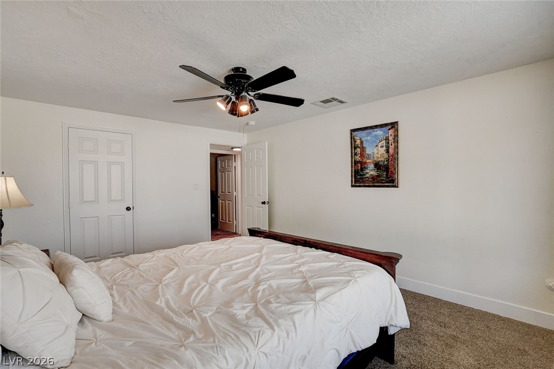 4362 Thistle Street Logandale, NV 89021 - Photo 59 of 99 A restful chamber offering comfort and ease, perfect for unwinding after a long day.