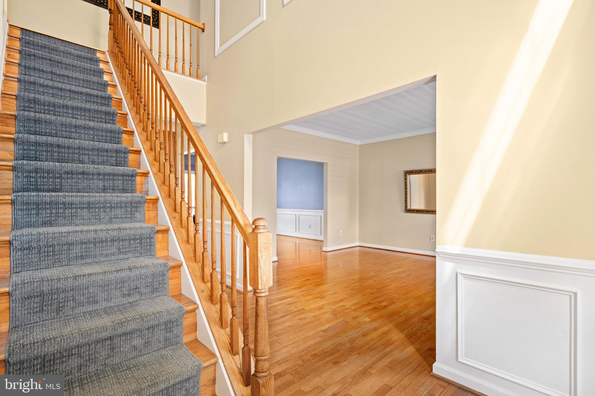 43232 Wayside Circle Ashburn, VA 20147 - Photo 14 of 105 a view of an entryway with wooden floor