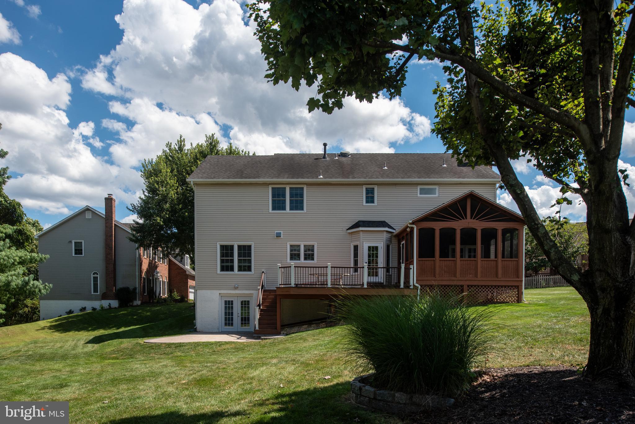 43232 Wayside Circle Ashburn, VA 20147 - Photo 97 of 105 a front view of a house with garden