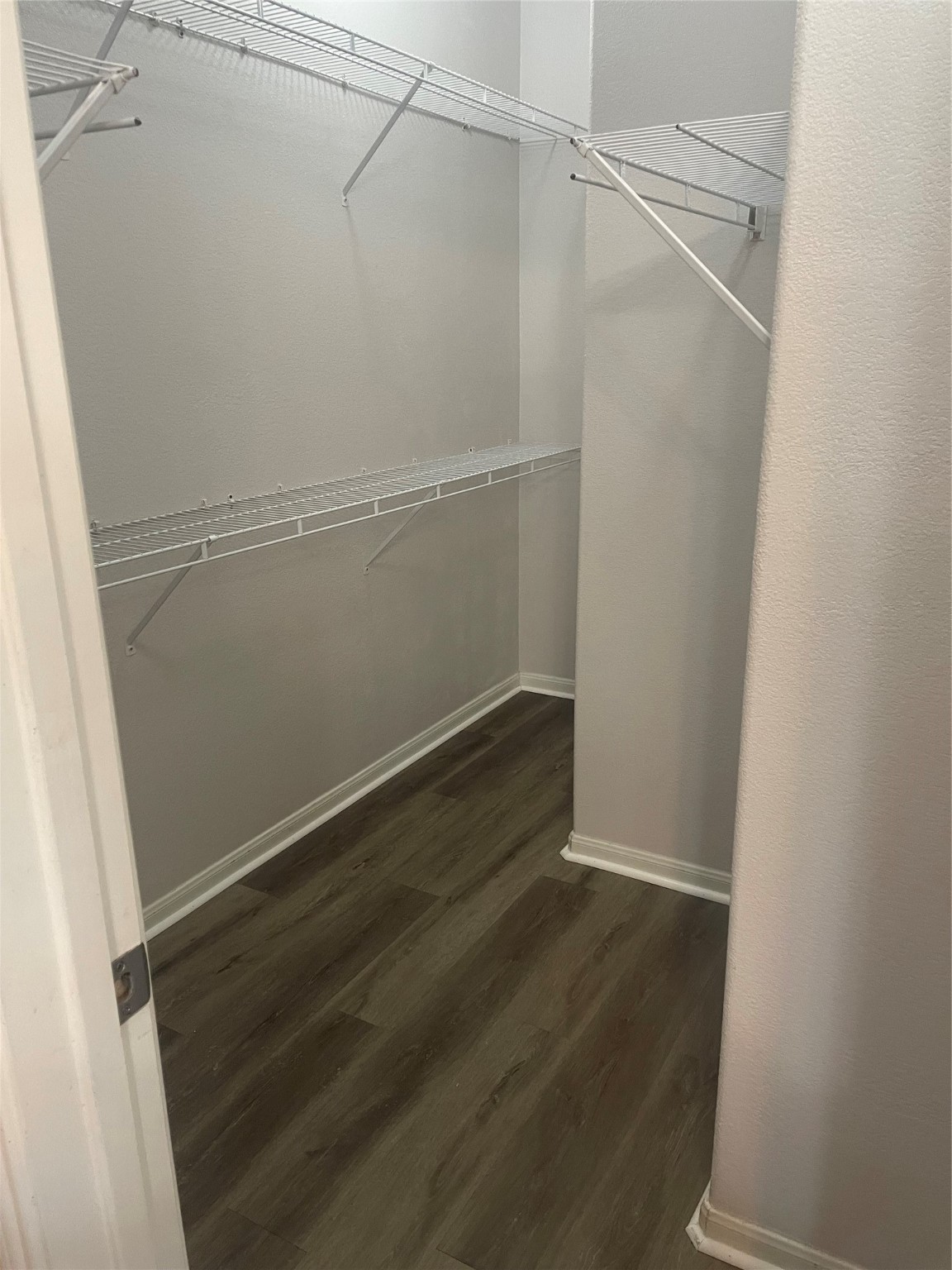 9200 Westheimer Road, Unit 1308 Houston, TX 77063 - Photo 10 of 12 a view of an empty walk in closet