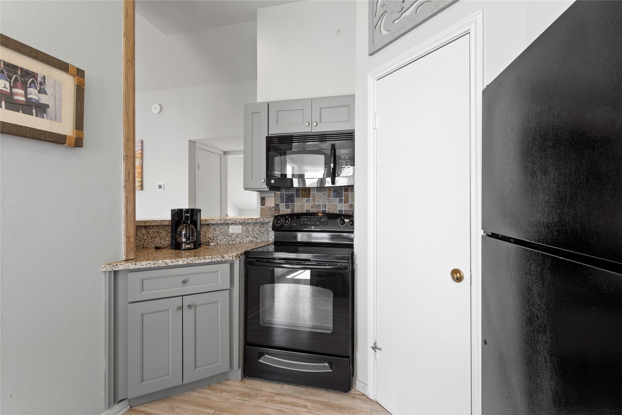 17627 Termini-San Luis Pass Road Galveston, TX 77554 - Photo 7 of 28 Enjoy effortless entertaining with the kitchen's spacious high ceilings.