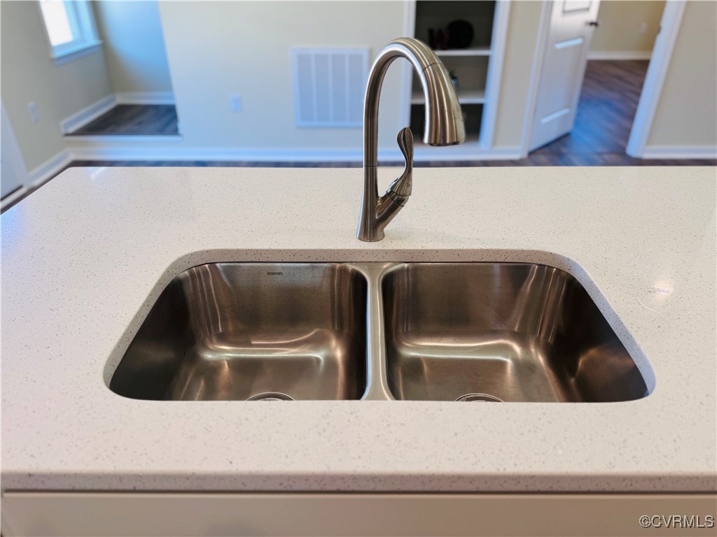 290 New South Ridge Bumpass, VA 23024 - Photo 11 of 50 Interior details with visible vents, a sink, and l