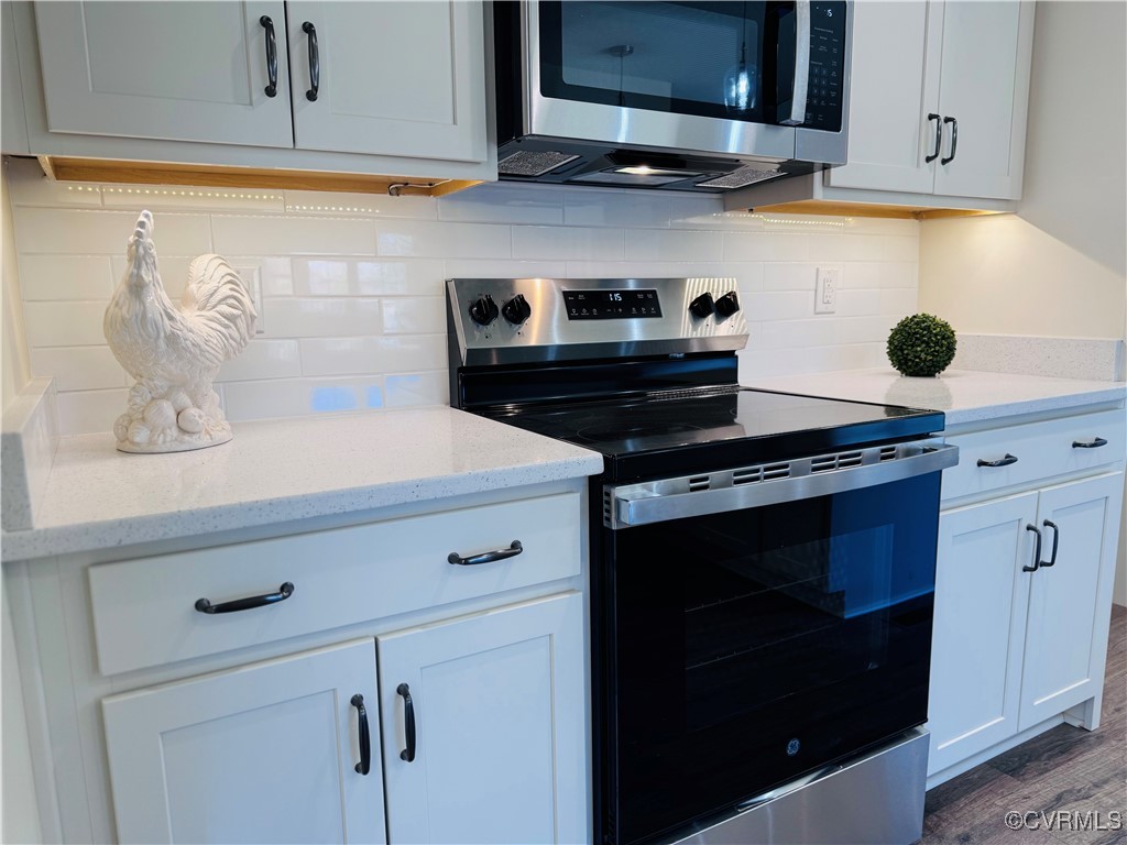 290 New South Ridge Bumpass, VA 23024 - Photo 12 of 50 Kitchen featuring white cabinetry, appliances with